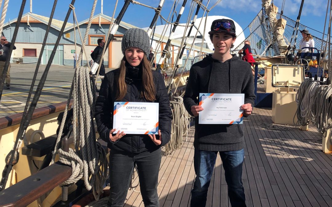 Rockingham Montessori students holding certificates after finishing the Leeuwin Ocean Adventure Voyage