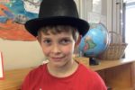 Rockingham Montessori student wearing a black hat for Upper Primary's art week