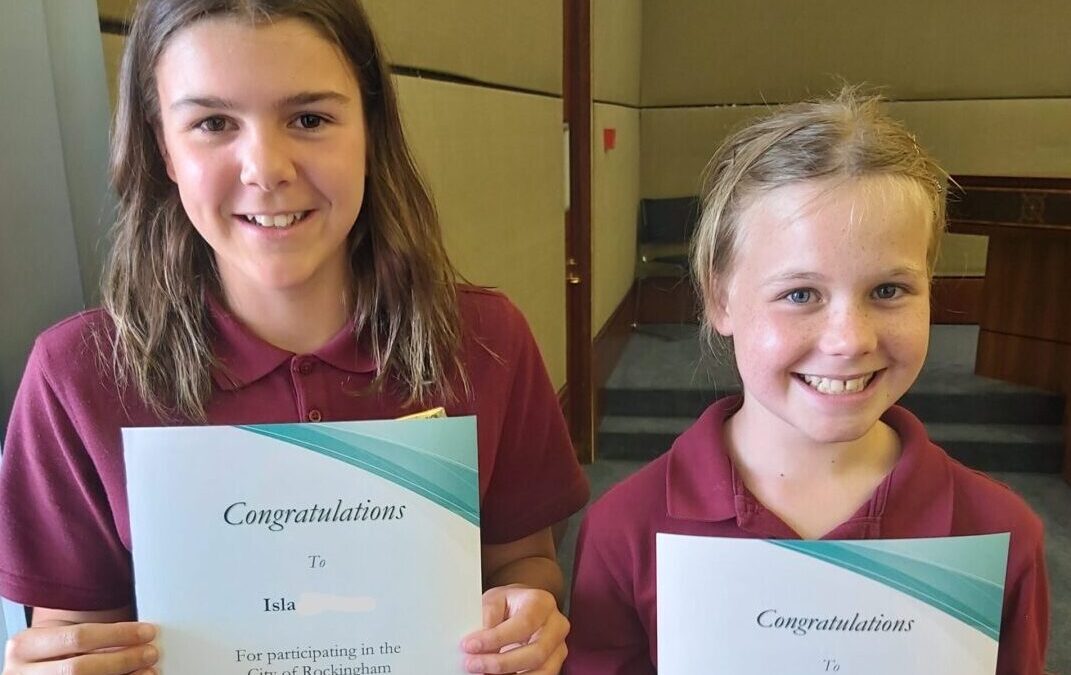 Children holding certificates for attending the City of Rockingham Junior Council