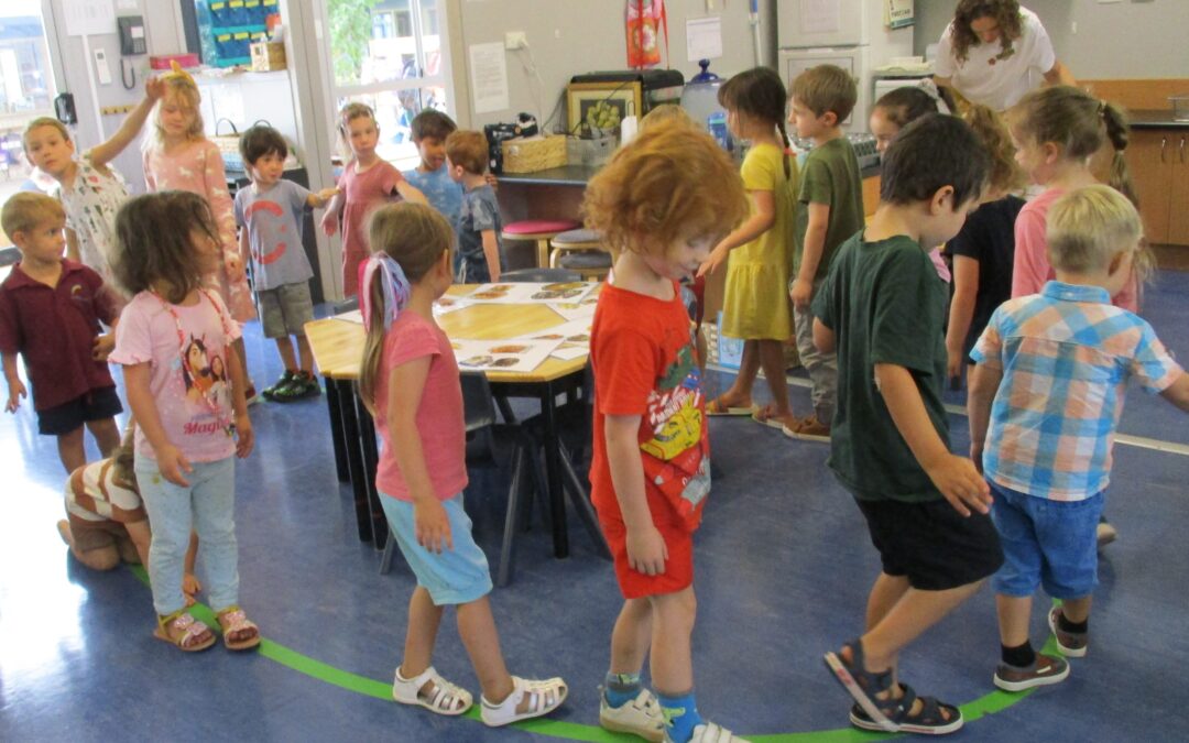 children walking in a circle in RMS Montessori Playgroup