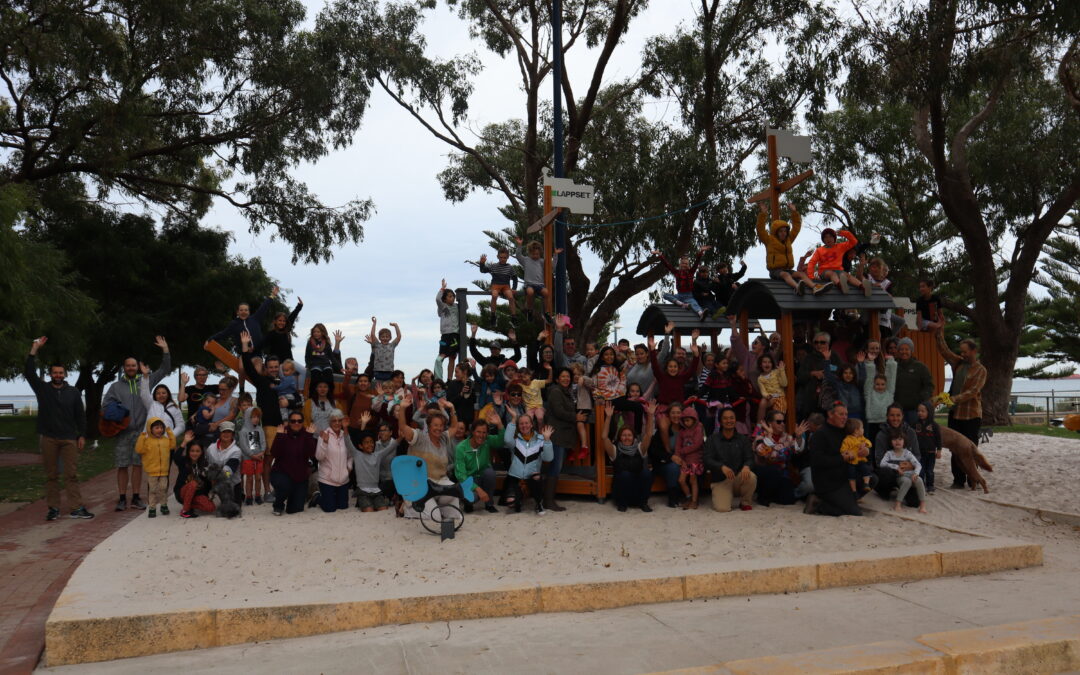 Rockingham Montessori teachers and students striking a pose in a playground in the beach